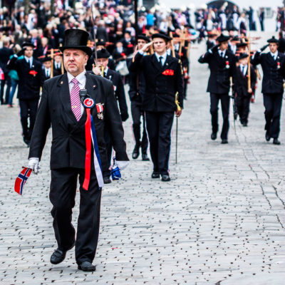 Celebratory Parades Coming from the Fløibanen Station, the Funicolar Railway of Bergen, until the District of Bryggen