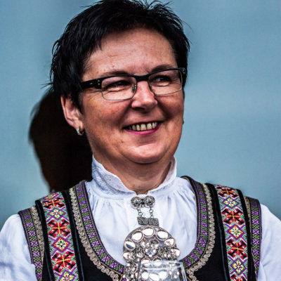 Norwegian Woman Wearing the Traditional Costume on the Bryggen Dock in Bergen nextprevious