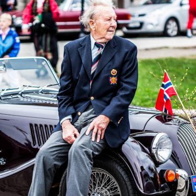 Old Norwegian Attends the Celebratory Parades along the Bryggen Dock