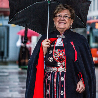 Woman Wearing the Traditional Bunad Lets Herself be Photographed near the Marketplace in Bergen