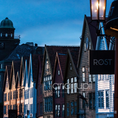 Painted Fronts and Sharp Roofs of Houses in Bryggen at the Sunset